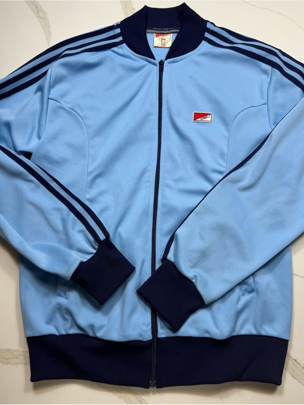 1970’s Vintage Sunbelt Light Blue Zip-Up Track Jacket with Navy Trim